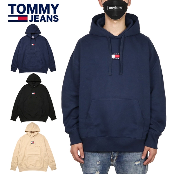 TJM TOMMY BADGE HOODIE DM0DM10904 パーカー プルオーバーパーカー